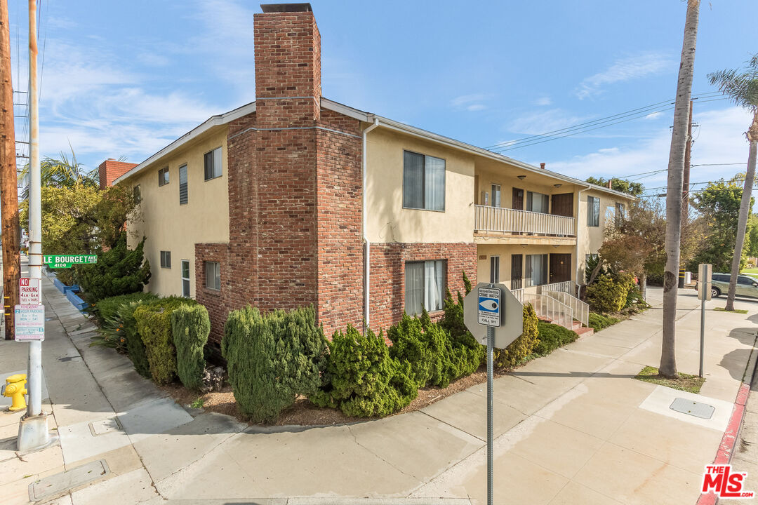 4100 Le Bourget Avenue Culver City, CA 90232 - Photo 11 of 12 a front view of a building with a garden