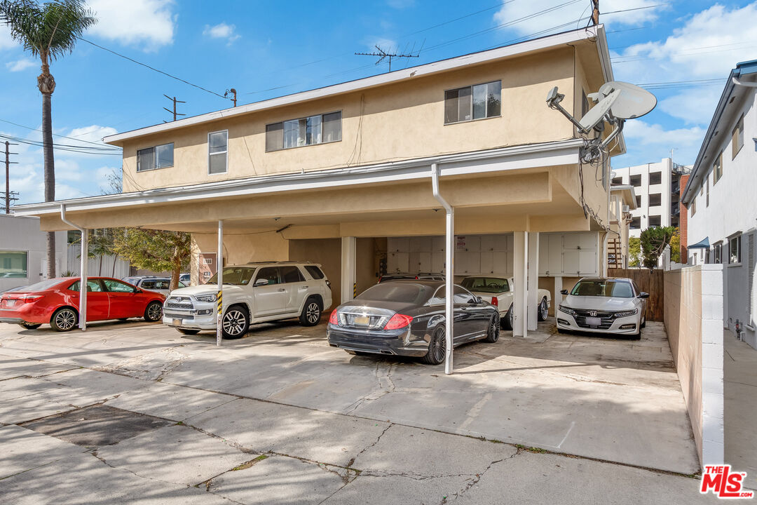 4100 Le Bourget Avenue Culver City, CA 90232 - Photo 6 of 12 a car parked in front of a house