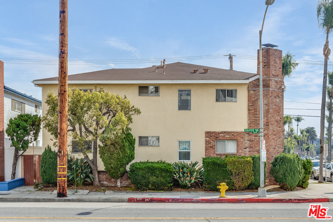 4100 Le Bourget Avenue Culver City, CA 90232 - Photo 10 of 12 a front view of a house with a yard