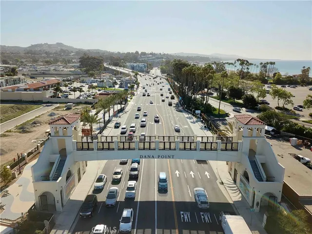 a building with palm trees in front of it