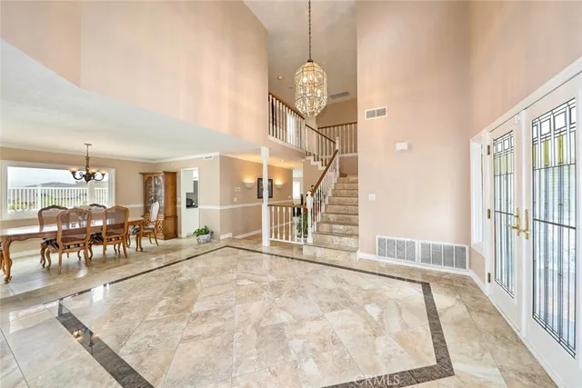 a view of a livingroom with furniture and a window