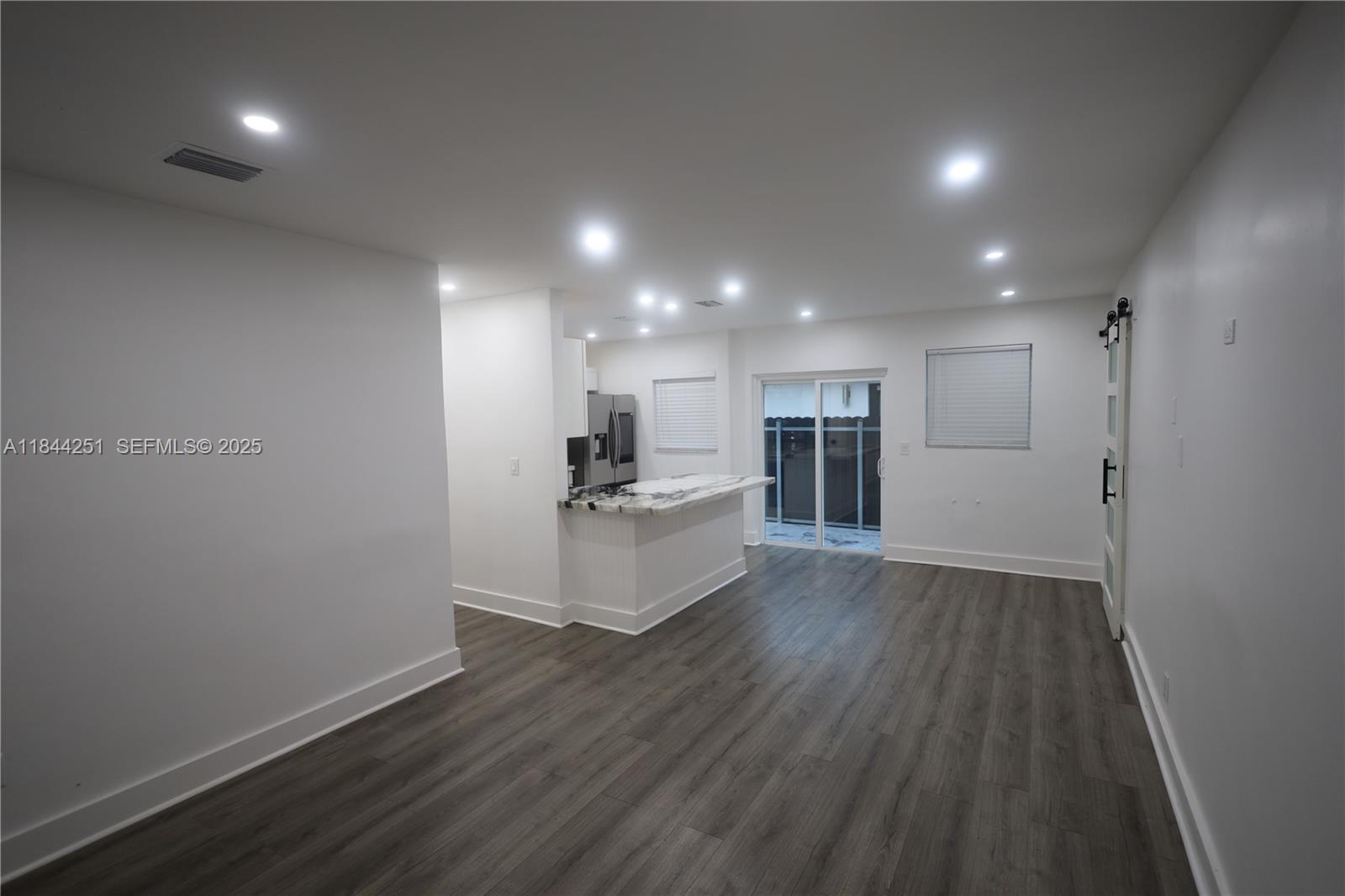 3955 Southwest 69th Avenue Miami, FL 33155 - Photo 18 of 35 a view of kitchen and wooden floor