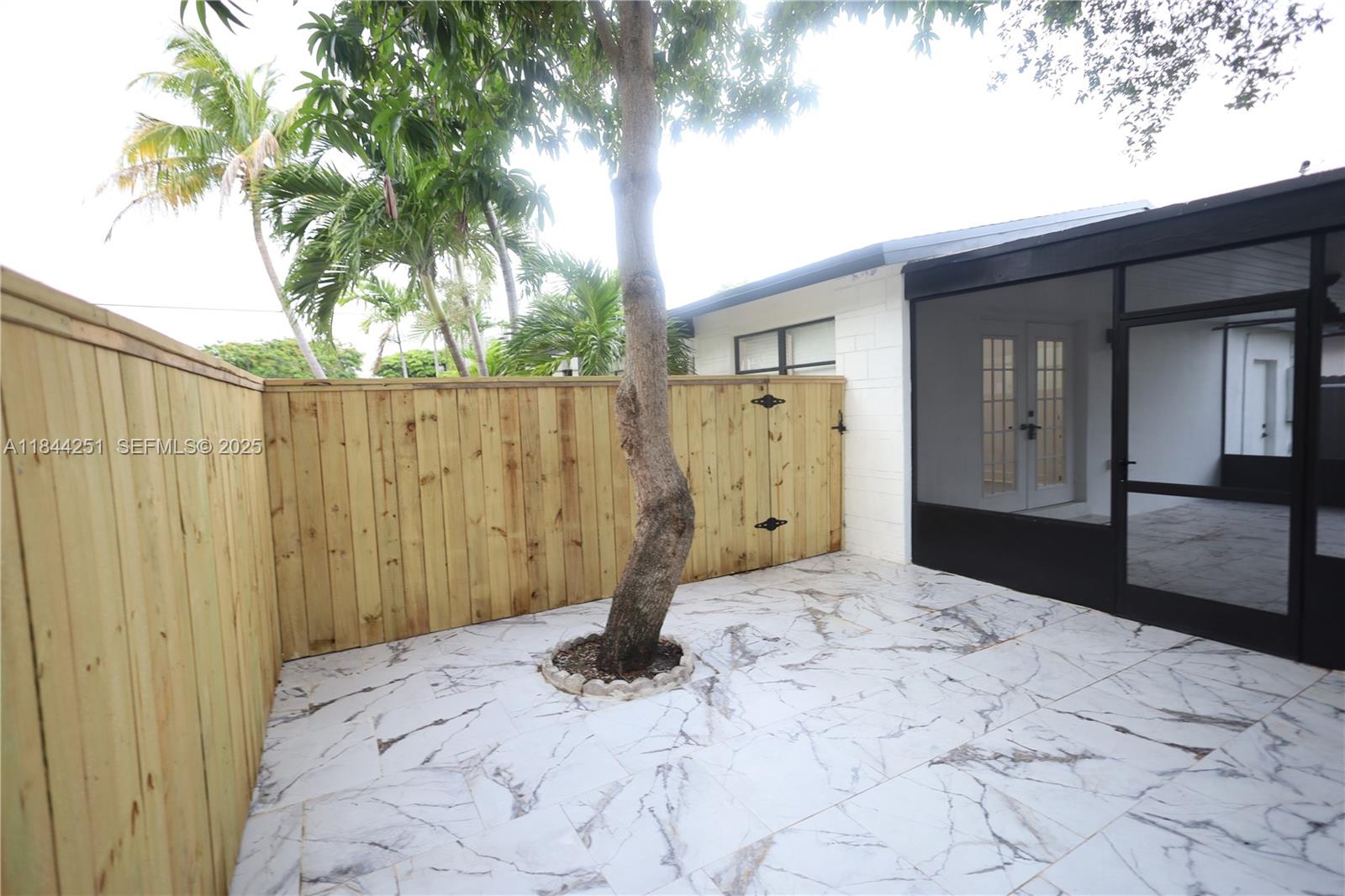 3955 Southwest 69th Avenue Miami, FL 33155 - Photo 33 of 35 a view of a backyard of a house