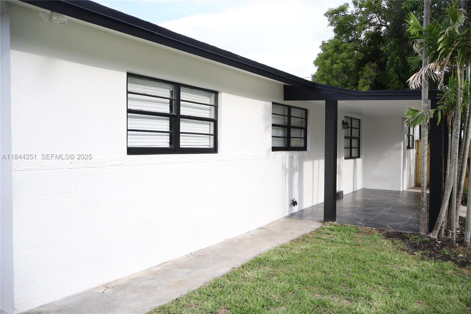 3955 Southwest 69th Avenue Miami, FL 33155 - Photo 5 of 35 a view of front door of house
