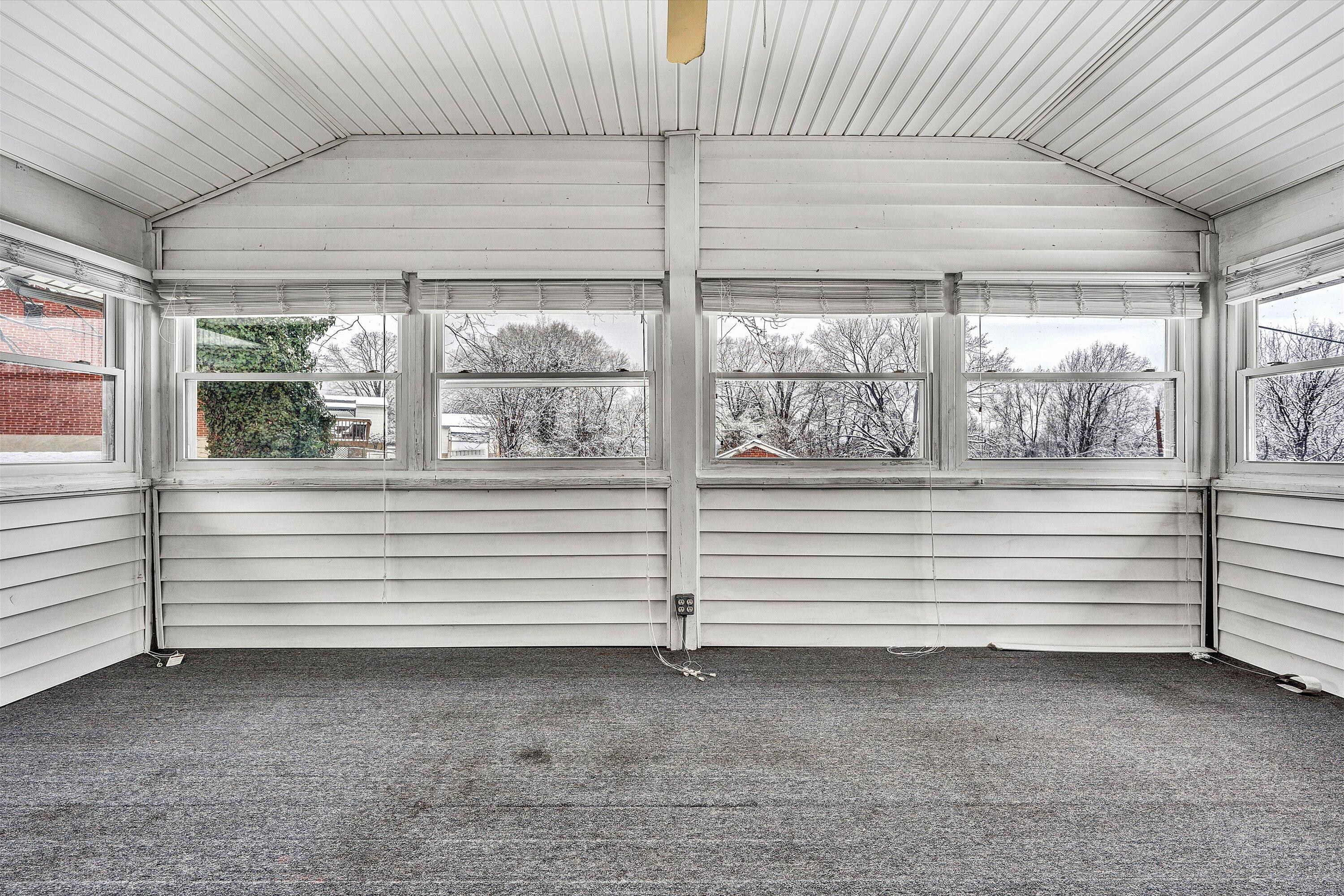 402 Cherryhill Road Northwest Roanoke, VA 24017 - Photo 18 of 42 a view of a room with window and a ceiling fan