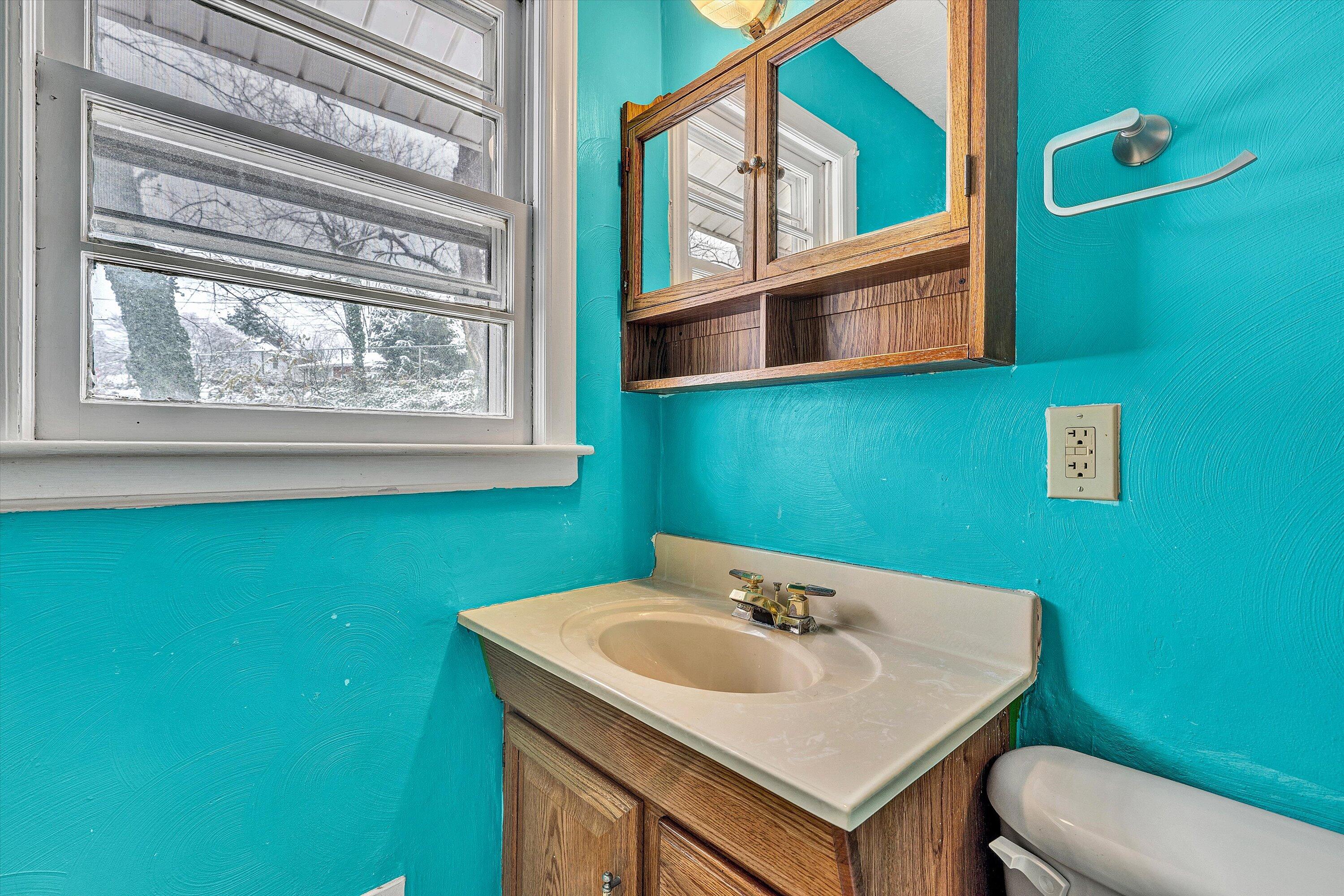 402 Cherryhill Road Northwest Roanoke, VA 24017 - Photo 26 of 42 a bathroom with a sink and a mirror