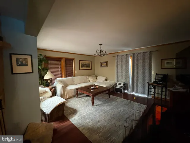 a view of a patio with a table and chairs