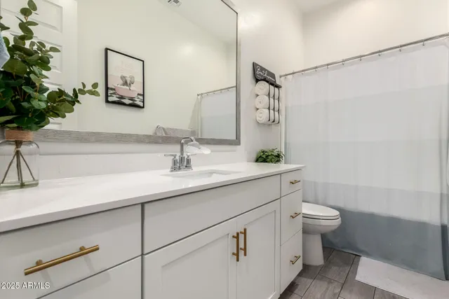 a view of a porch with furniture and a yard