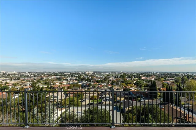 a view of a city from a balcony