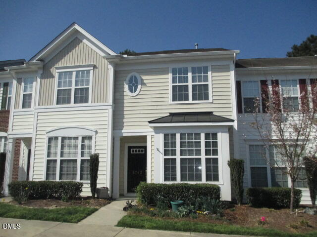 front view of a house and a yard