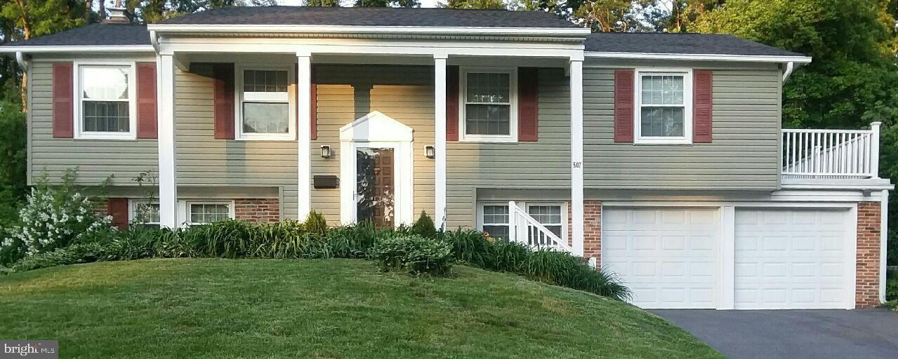 Updated exterior with windows, siding, and roof