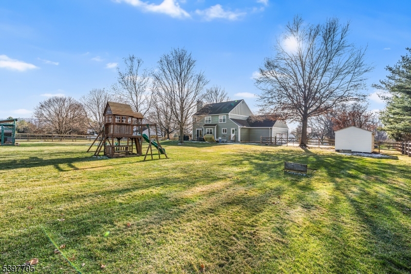 50 Blau Road Hackettstown, NJ 07840 - Photo 30 of 35 a swimming pool with outdoor seating and yard