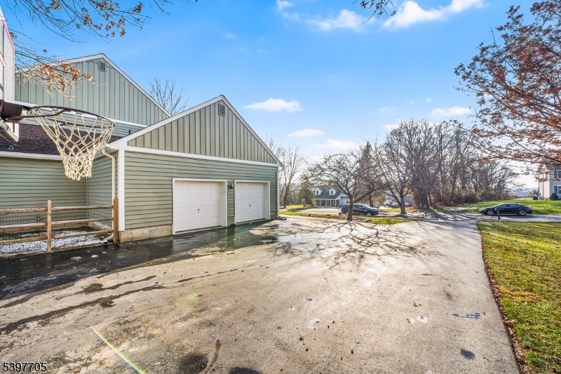 50 Blau Road Hackettstown, NJ 07840 - Photo 3 of 35 a view of a house with a yard and garage