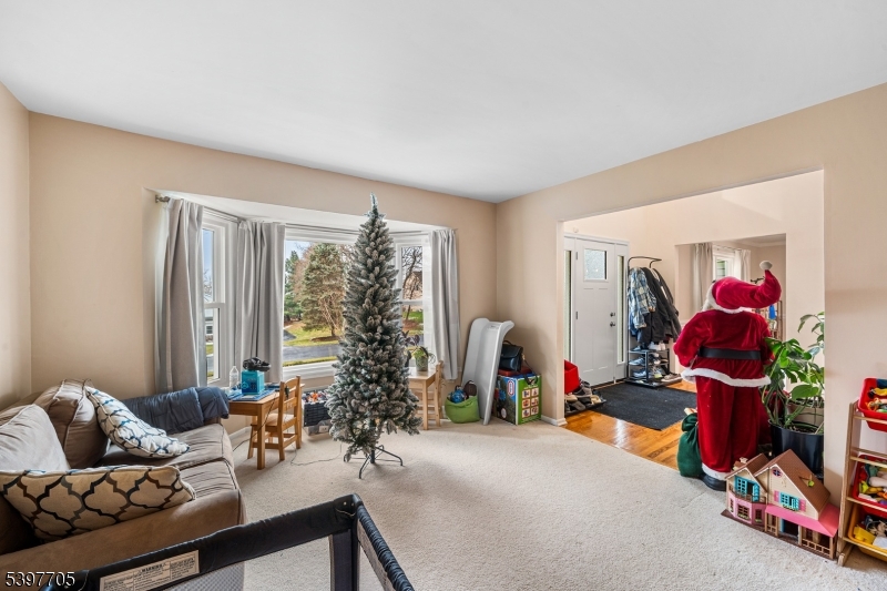 50 Blau Road Hackettstown, NJ 07840 - Photo 9 of 35 a living room with furniture and a large window