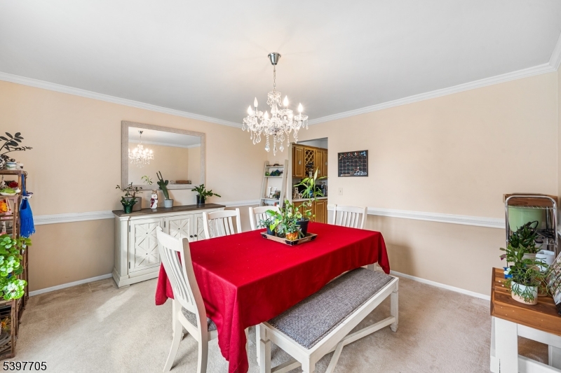 50 Blau Road Hackettstown, NJ 07840 - Photo 10 of 35 a view of a dining room with furniture and a chandelier