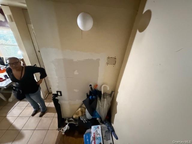 2120 Clinton Avenue Bronx, NY 10457 - Photo 18 of 21 a view of a room with gym equipment