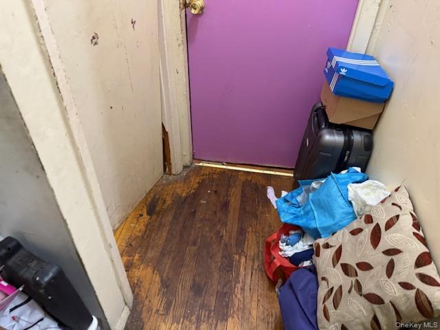 2120 Clinton Avenue Bronx, NY 10457 - Photo 9 of 21 a blue house with wooden floor