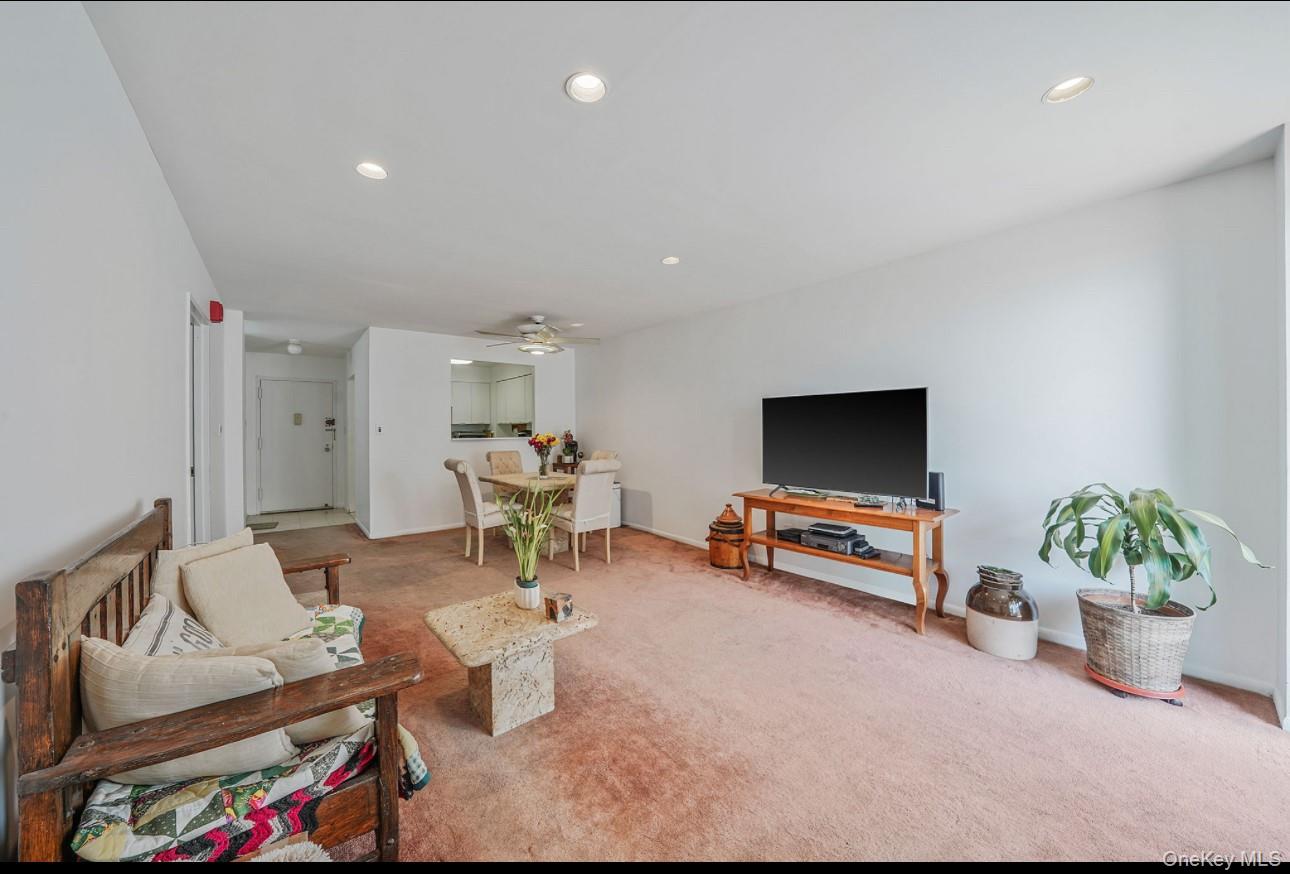 360 Shore Road, Unit 4B Long Beach, NY 11561 - Photo 20 of 28 Carpeted living area featuring recessed lighting and ceiling fan