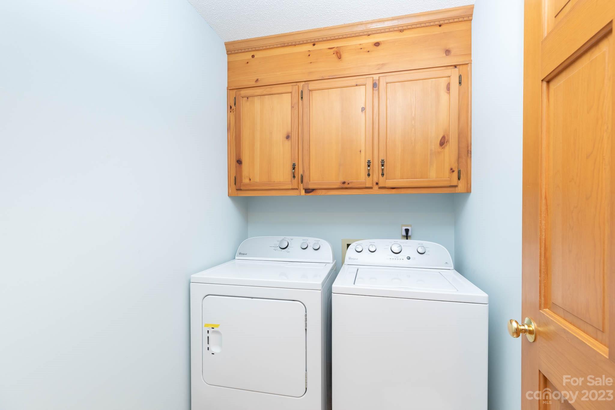 7869 Cherry Point Drive Denver, NC 28037 - Photo 17 of 38 a utility room with dryer and washer