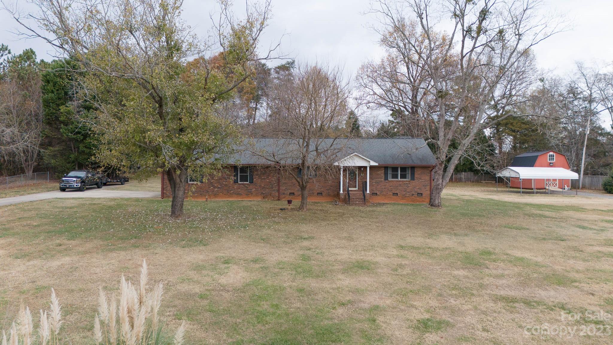 7869 Cherry Point Drive Denver, NC 28037 - Photo 2 of 38 a view of outdoor space with trees