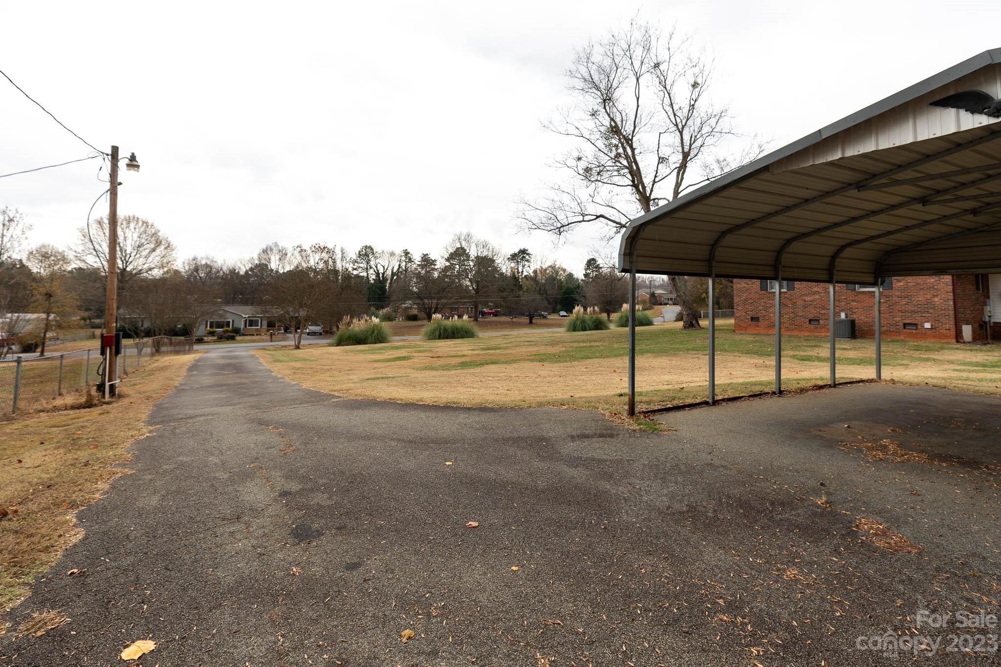 7869 Cherry Point Drive Denver, NC 28037 - Photo 32 of 38 a view of a road with a road