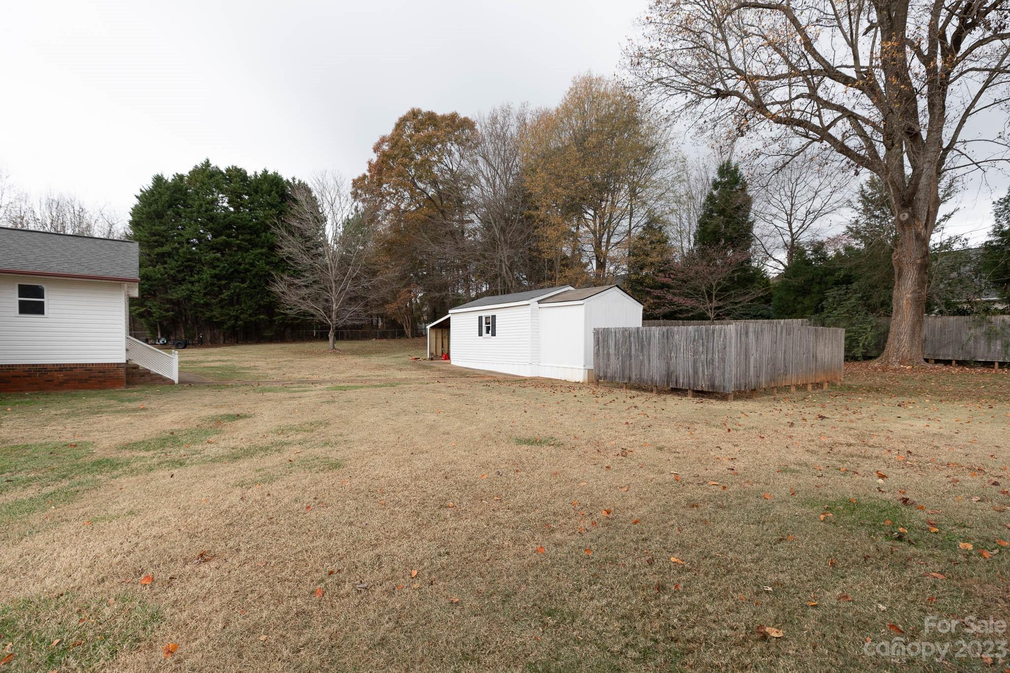 7869 Cherry Point Drive Denver, NC 28037 - Photo 35 of 38 a backyard of a house