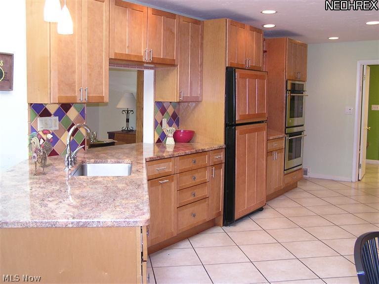 2859 Brainard Road Cleveland, OH 44124 - Photo 18 of 25 Passthrough into Dining Room with good counter space for preparing, serving, and cleaning up.