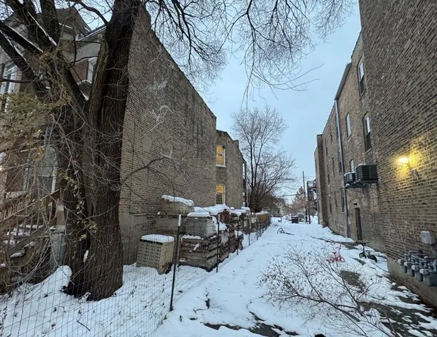 a view of a backyard of the house