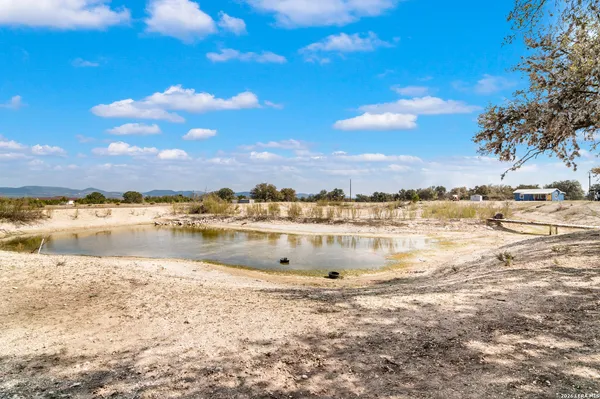 a view of a lake with a beach