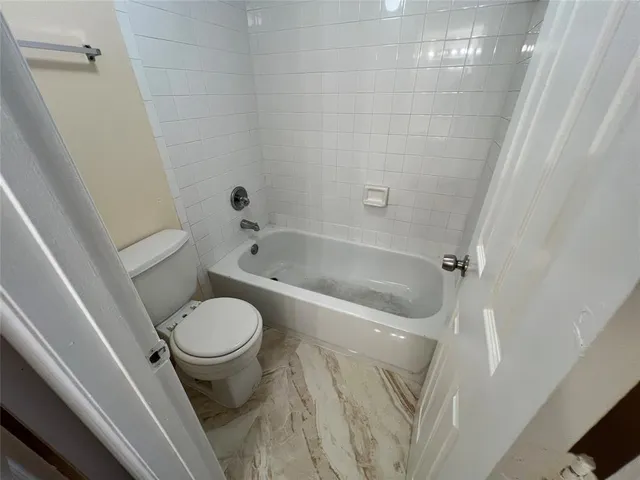 a bathroom with a sink and toilet