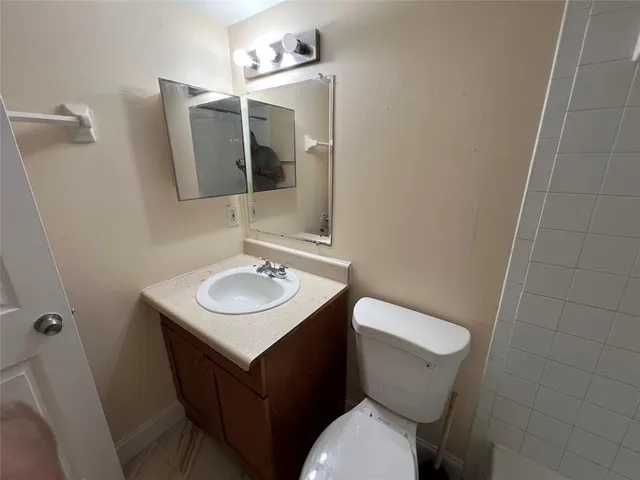 a bathroom with a sink and a toilet