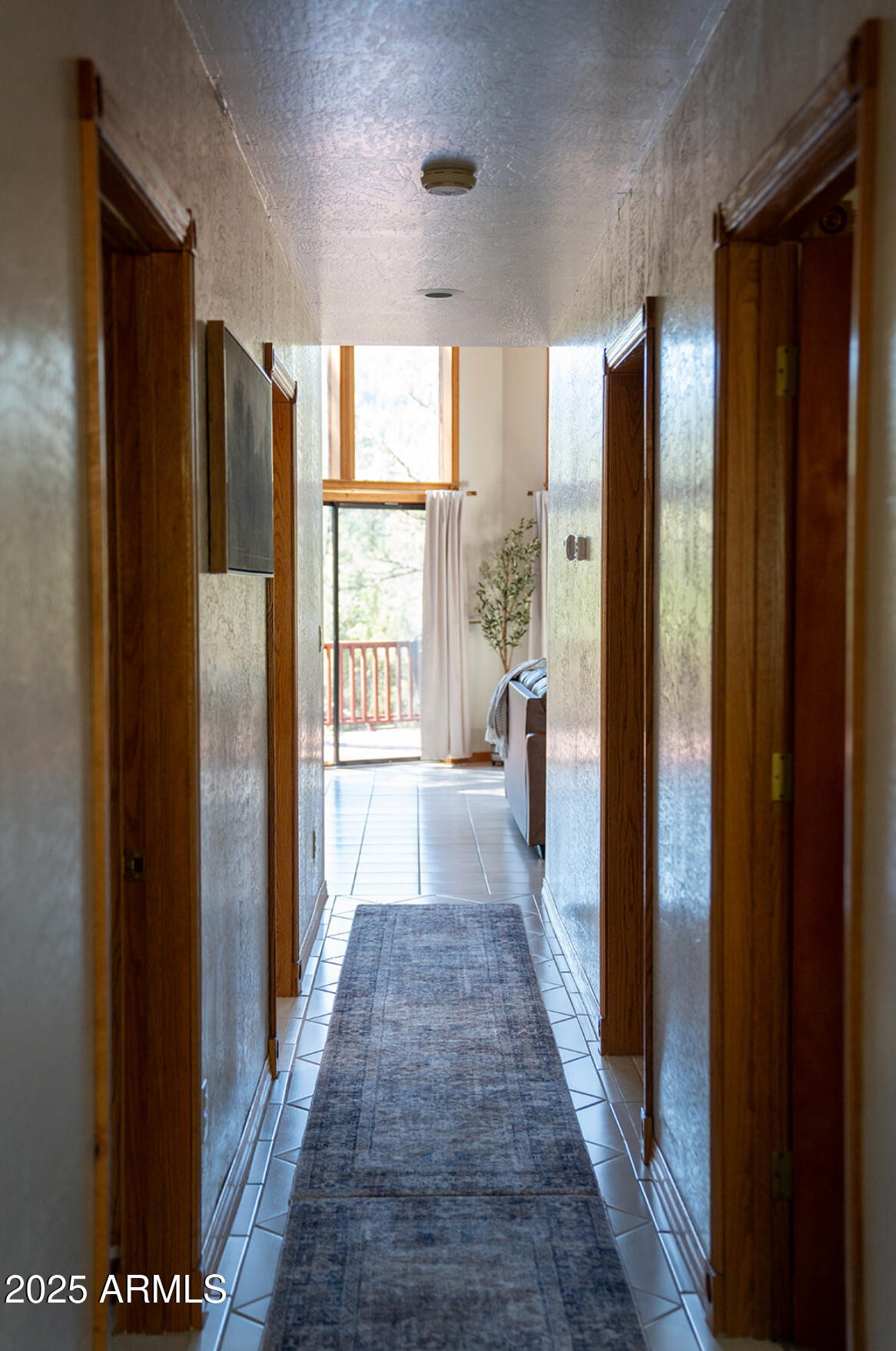 9651 Wild Turkey Lane Strawberry, AZ 85544 - Photo 12 of 41 a view of a hallway with windows