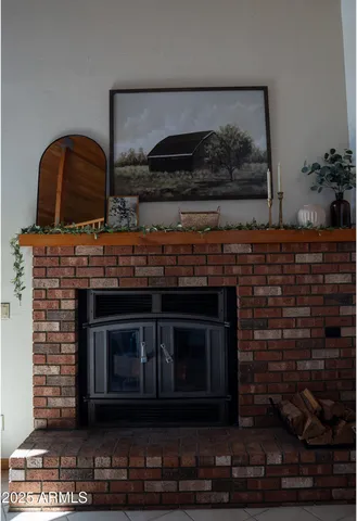 a stove top oven sitting inside of a kitchen