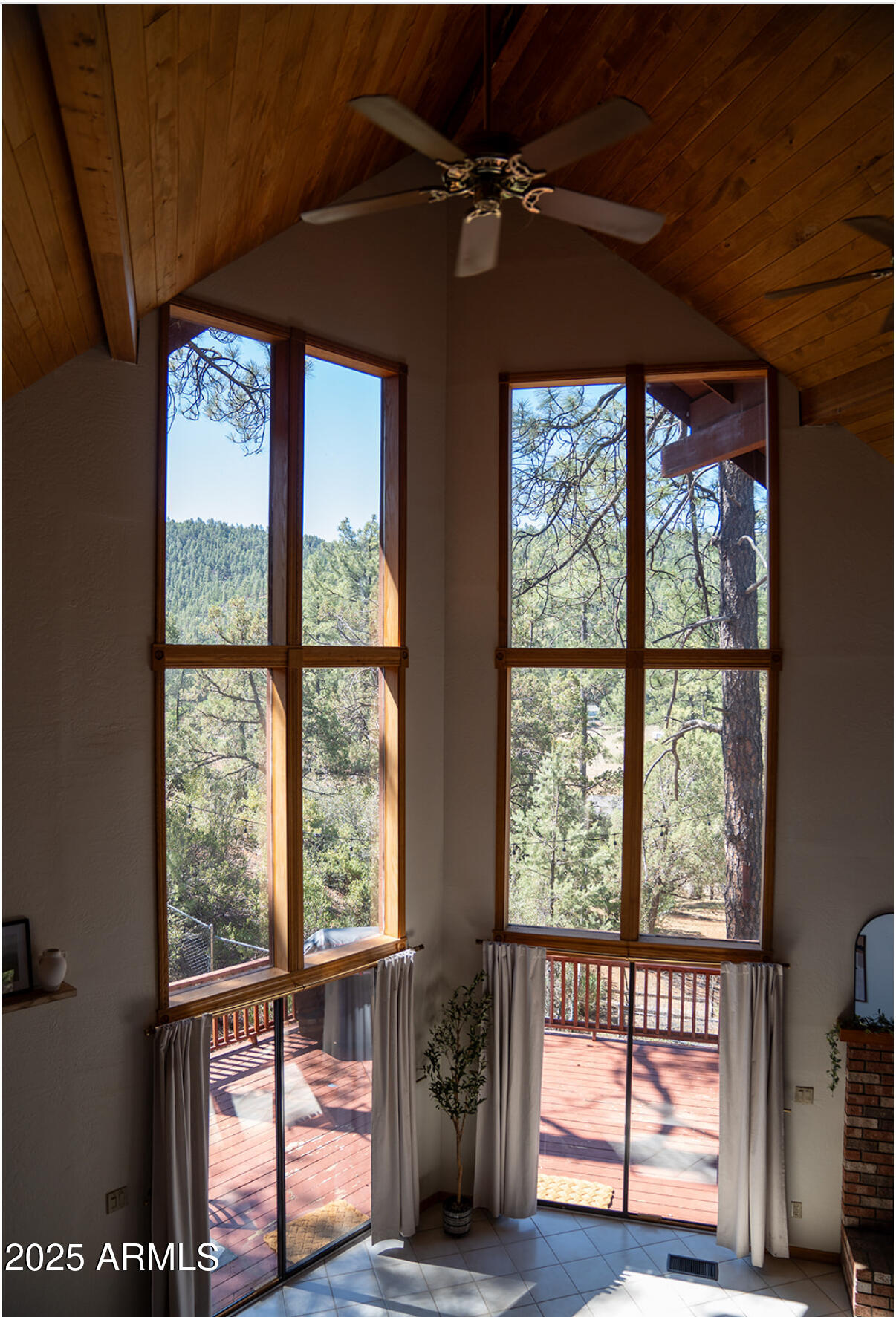 9651 Wild Turkey Lane Strawberry, AZ 85544 - Photo 17 of 41 a front view of a house with wooden floor