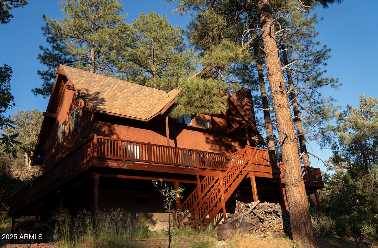 9651 Wild Turkey Lane Strawberry, AZ 85544 - Photo 2 of 41 a view of a house with a tree
