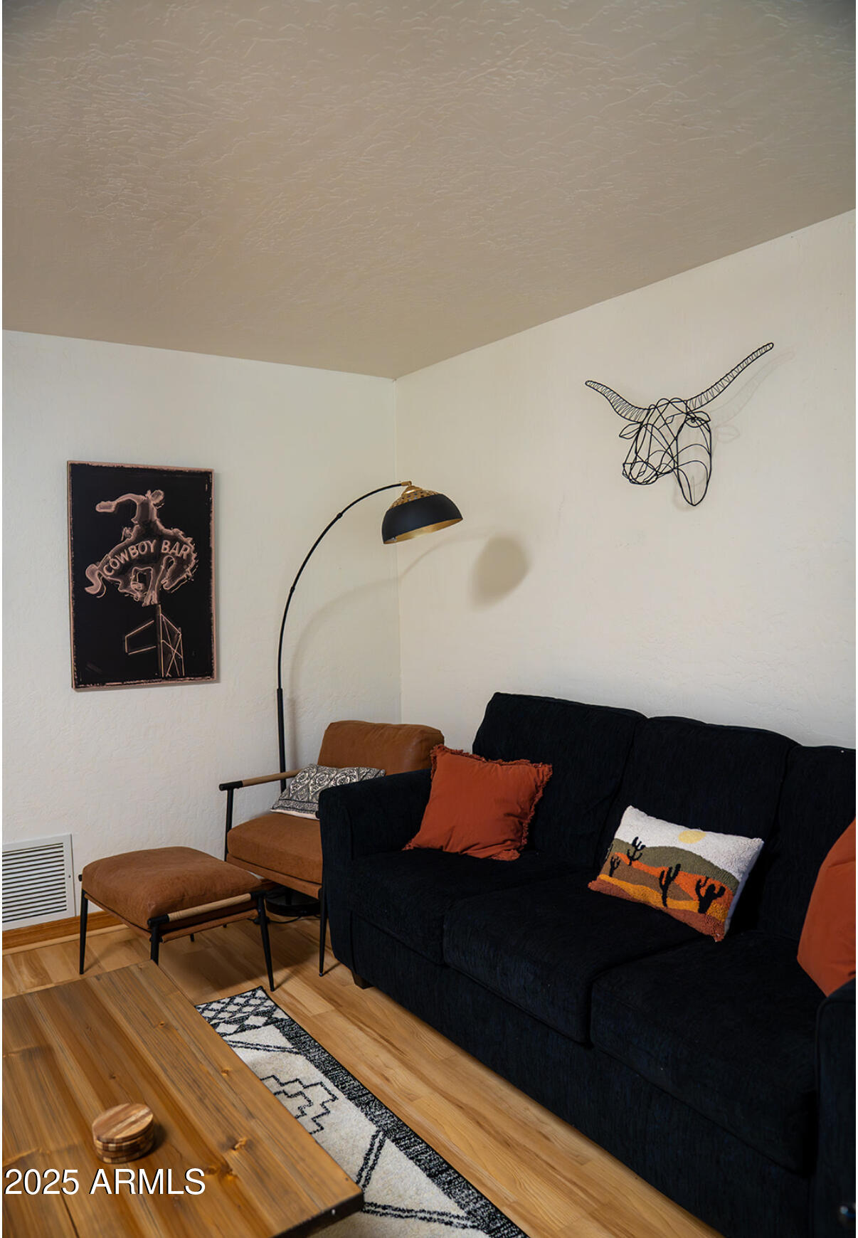 9651 Wild Turkey Lane Strawberry, AZ 85544 - Photo 36 of 41 a living room with furniture and a rug