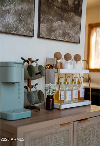 a room with lots of books and cabinets
