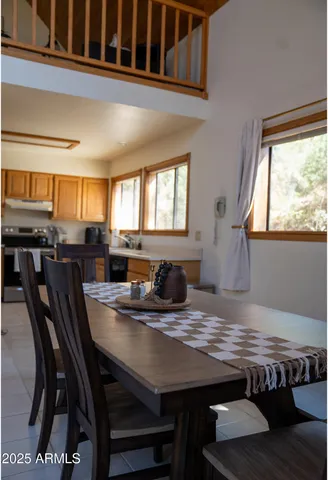 a view of a dining room with furniture