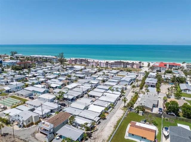 an aerial view of a city with lots of residential buildings