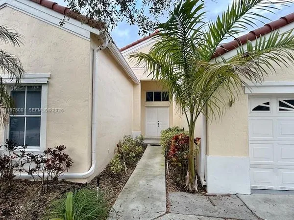 a view of a house with a patio