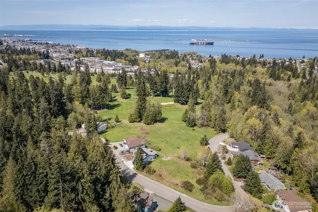 a aerial view of a house with a yard