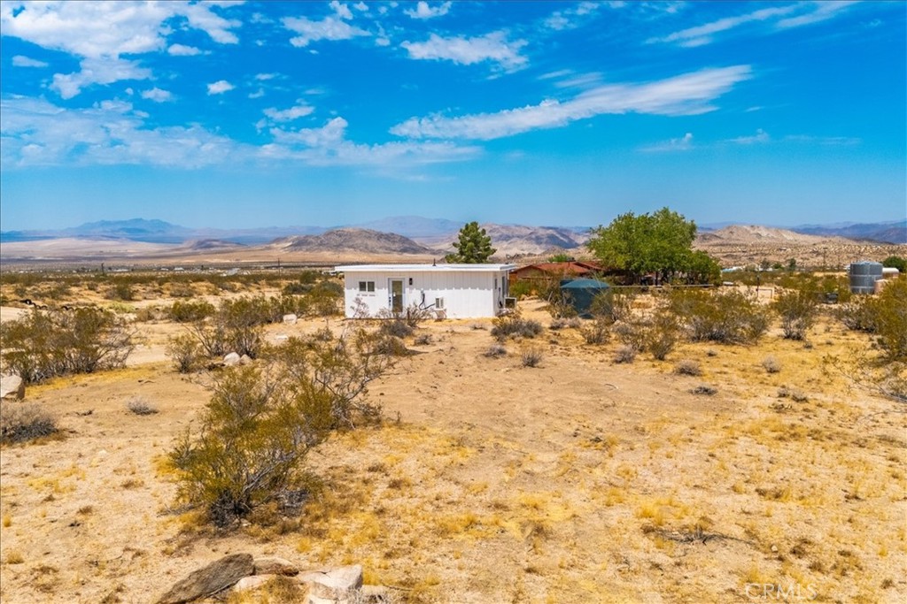 777 Quail Bush Road Landers, CA 92285 - Photo 22 of 46 a view of a sky from a yard