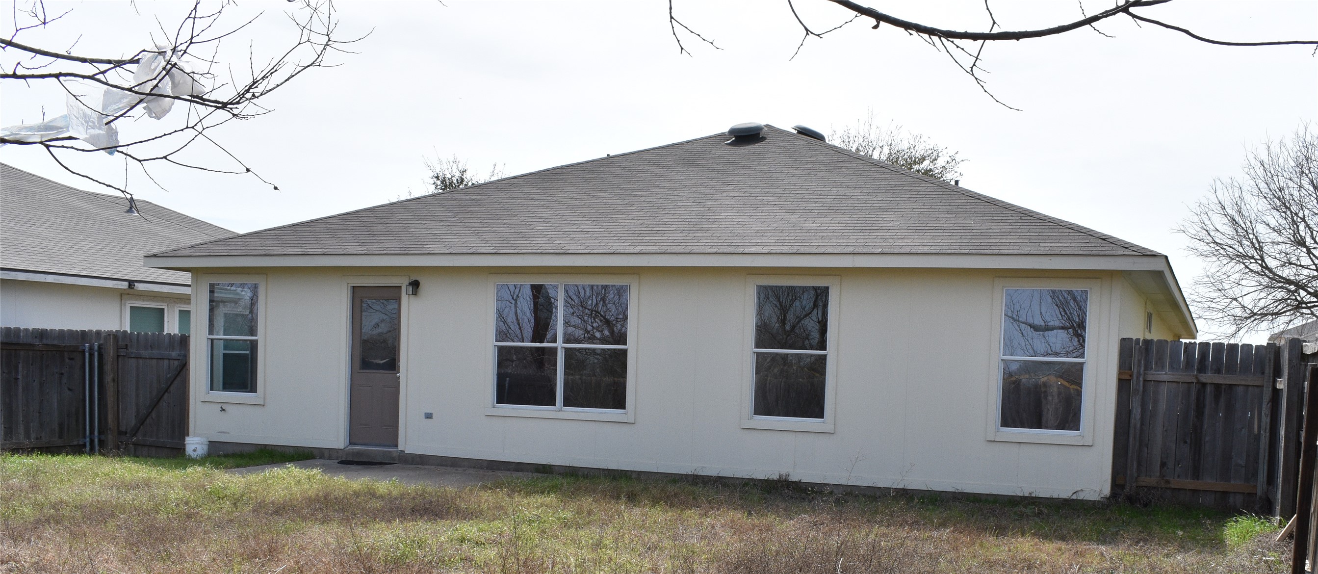 804 Lavaca Loop Elgin, TX 78621 - Photo 11 of 11 View of the exterior back of the house