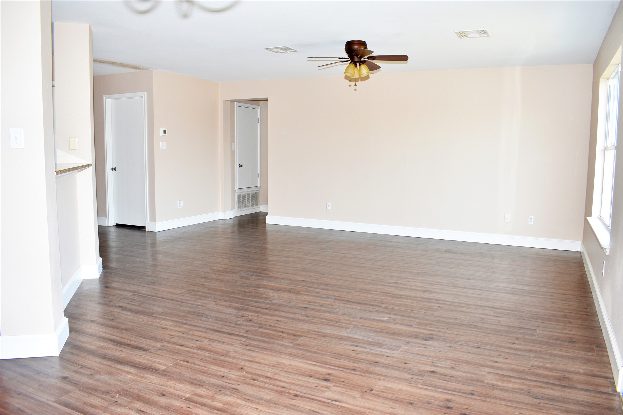 804 Lavaca Loop Elgin, TX 78621 - Photo 2 of 11 Living area open to the kitchen