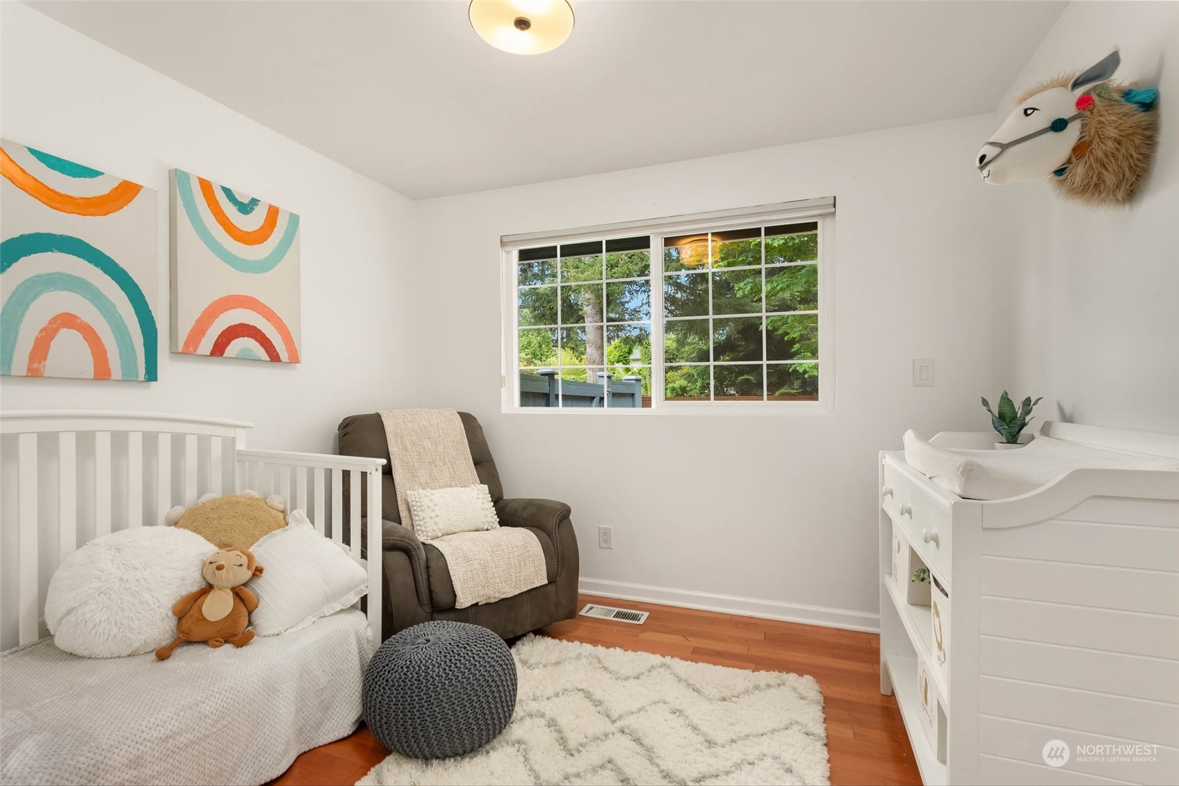 4200 Northeast 19th Street Renton, WA 98059 - Photo 17 of 25 a bedroom with furniture and a window