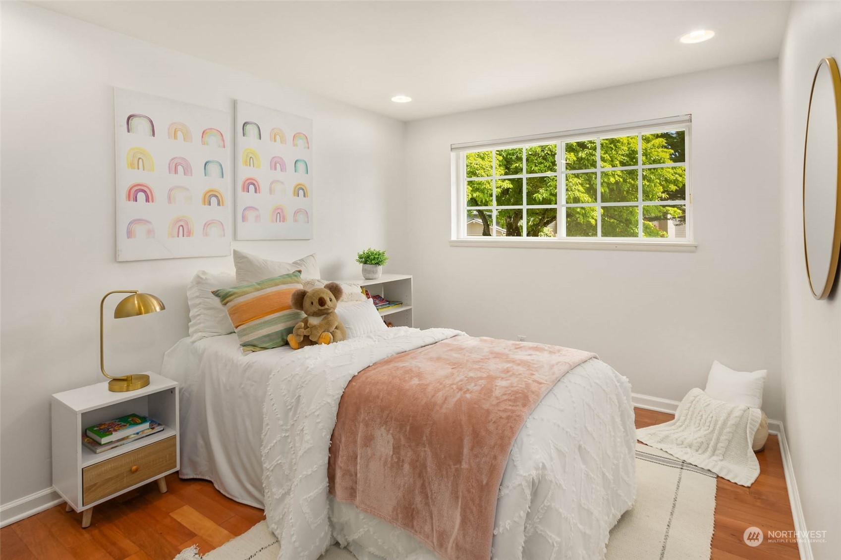 4200 Northeast 19th Street Renton, WA 98059 - Photo 18 of 25 a bedroom with a bed and a window