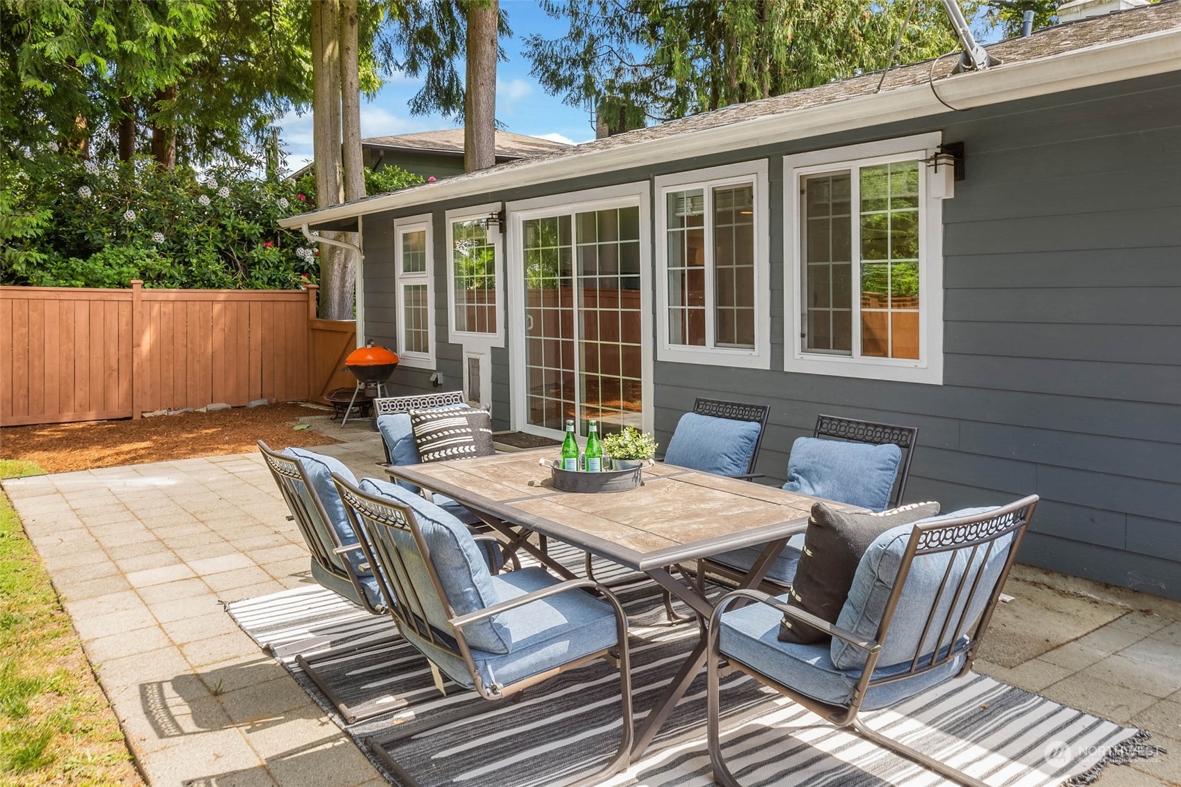 4200 Northeast 19th Street Renton, WA 98059 - Photo 5 of 25 a view of a patio with a table and chairs
