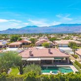 a view of a city with mountains in the background