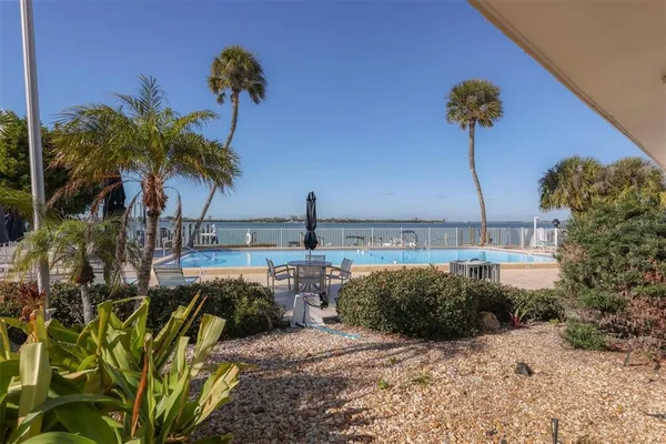 a view of a backyard of a house