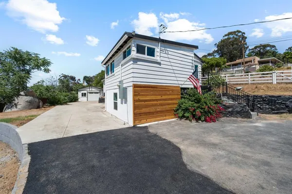 a house view with a outdoor space